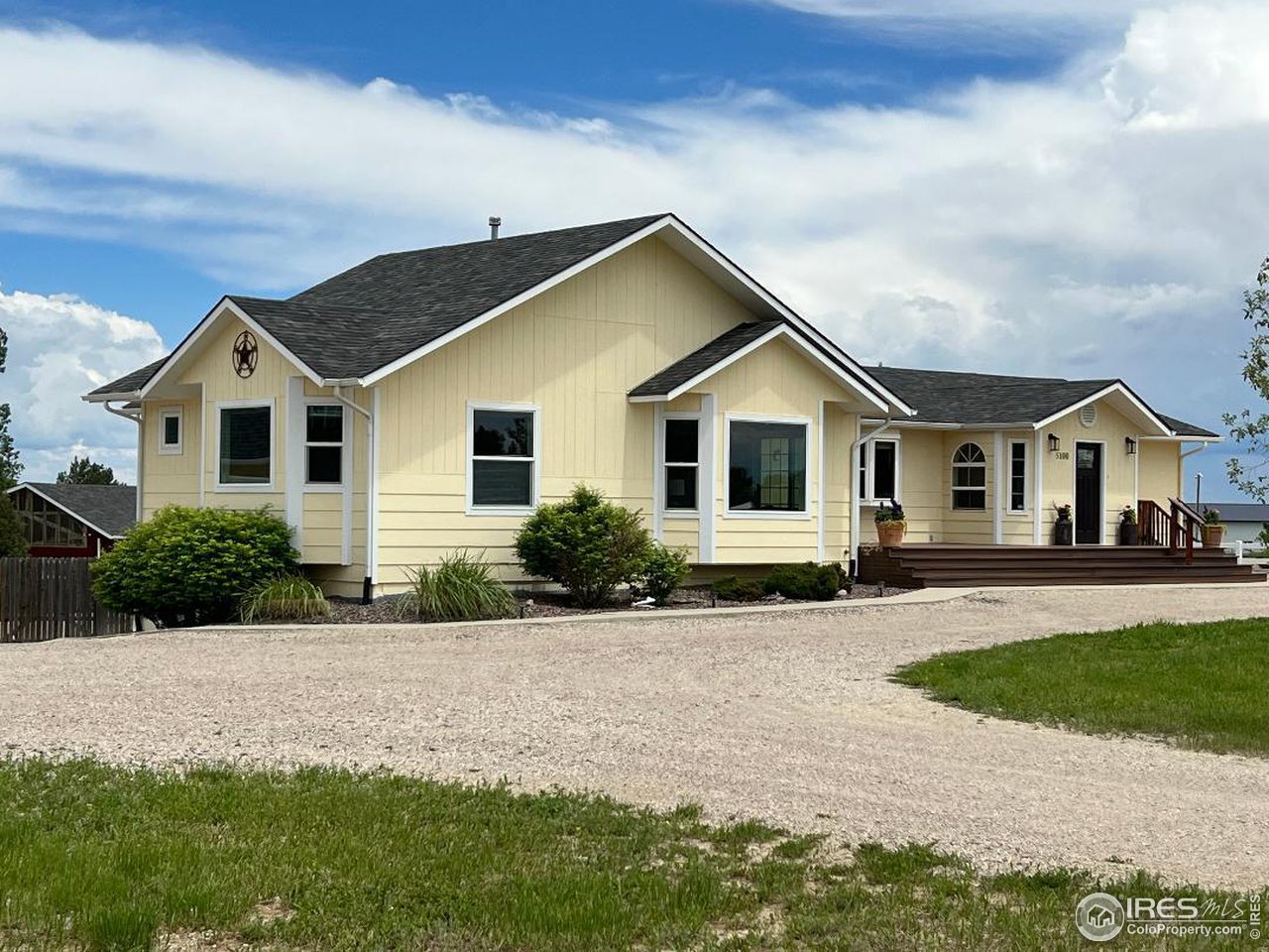 5100 Glen Drive Berthoud, CO 80513 - Photo 2 of 40 a view of house with yard and green space
