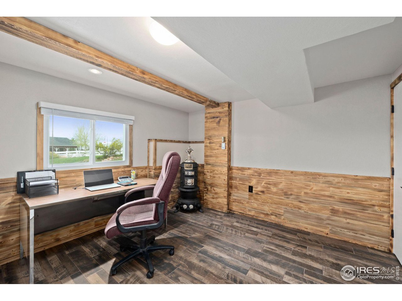 5100 Glen Drive Berthoud, CO 80513 - Photo 28 of 40 a view of a workspace with furniture and a window
