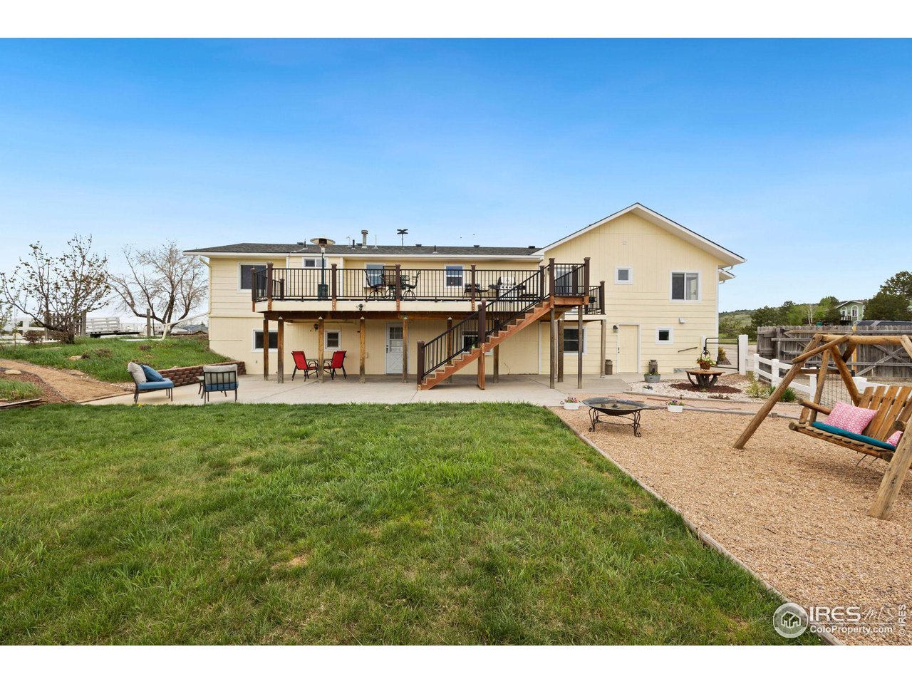 5100 Glen Drive Berthoud, CO 80513 - Photo 31 of 40 a view of a house with backyard porch and sitting area