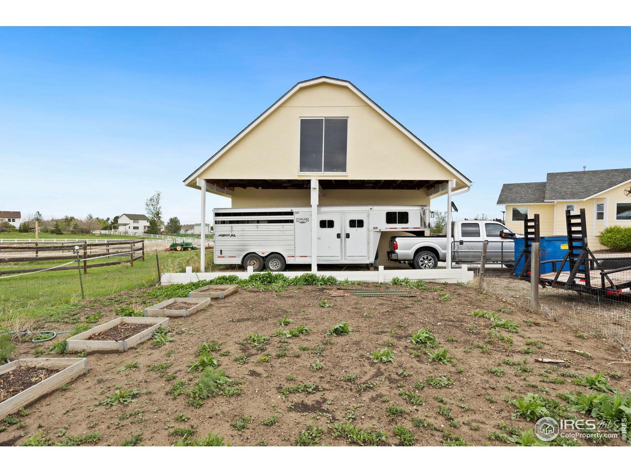 5100 Glen Drive Berthoud, CO 80513 - Photo 34 of 40 a view of a house with a yard