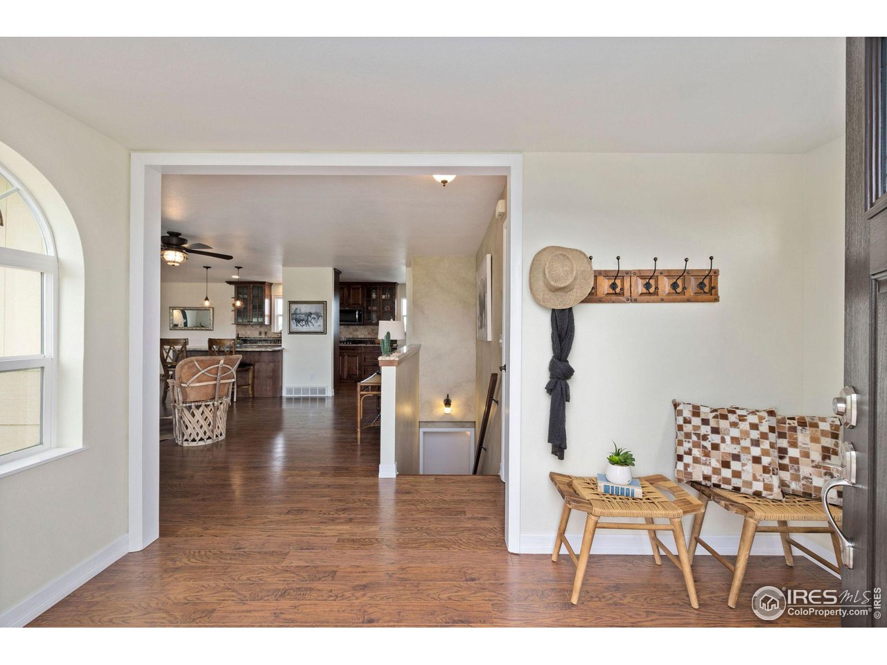 5100 Glen Drive Berthoud, CO 80513 - Photo 6 of 40 a living room with furniture and wooden floor