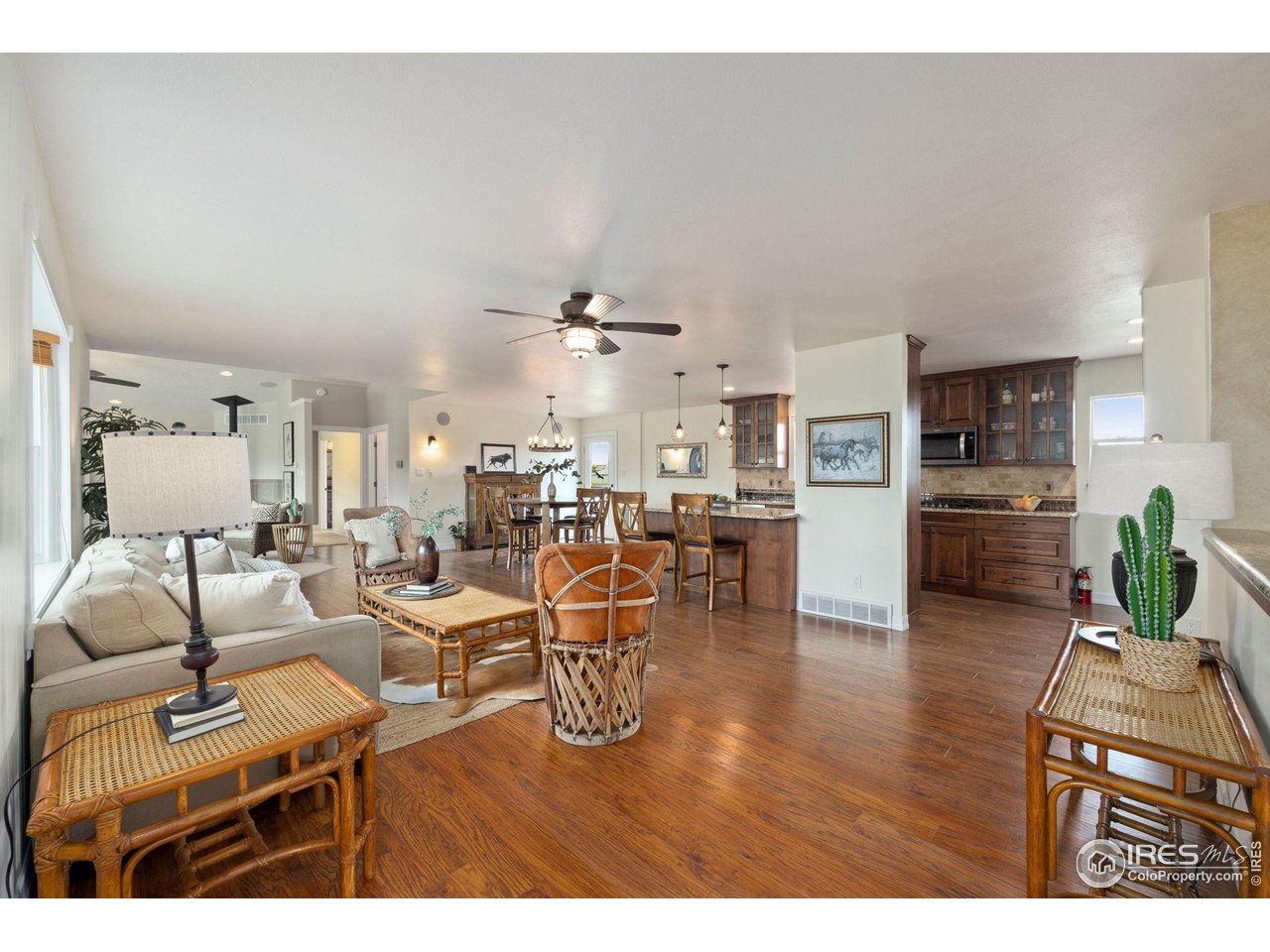 5100 Glen Drive Berthoud, CO 80513 - Photo 7 of 40 a living room with lots of furniture and kitchen view