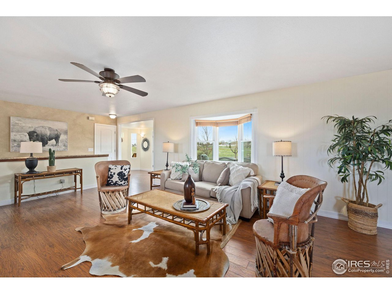 5100 Glen Drive Berthoud, CO 80513 - Photo 9 of 40 a living room with furniture and a large window