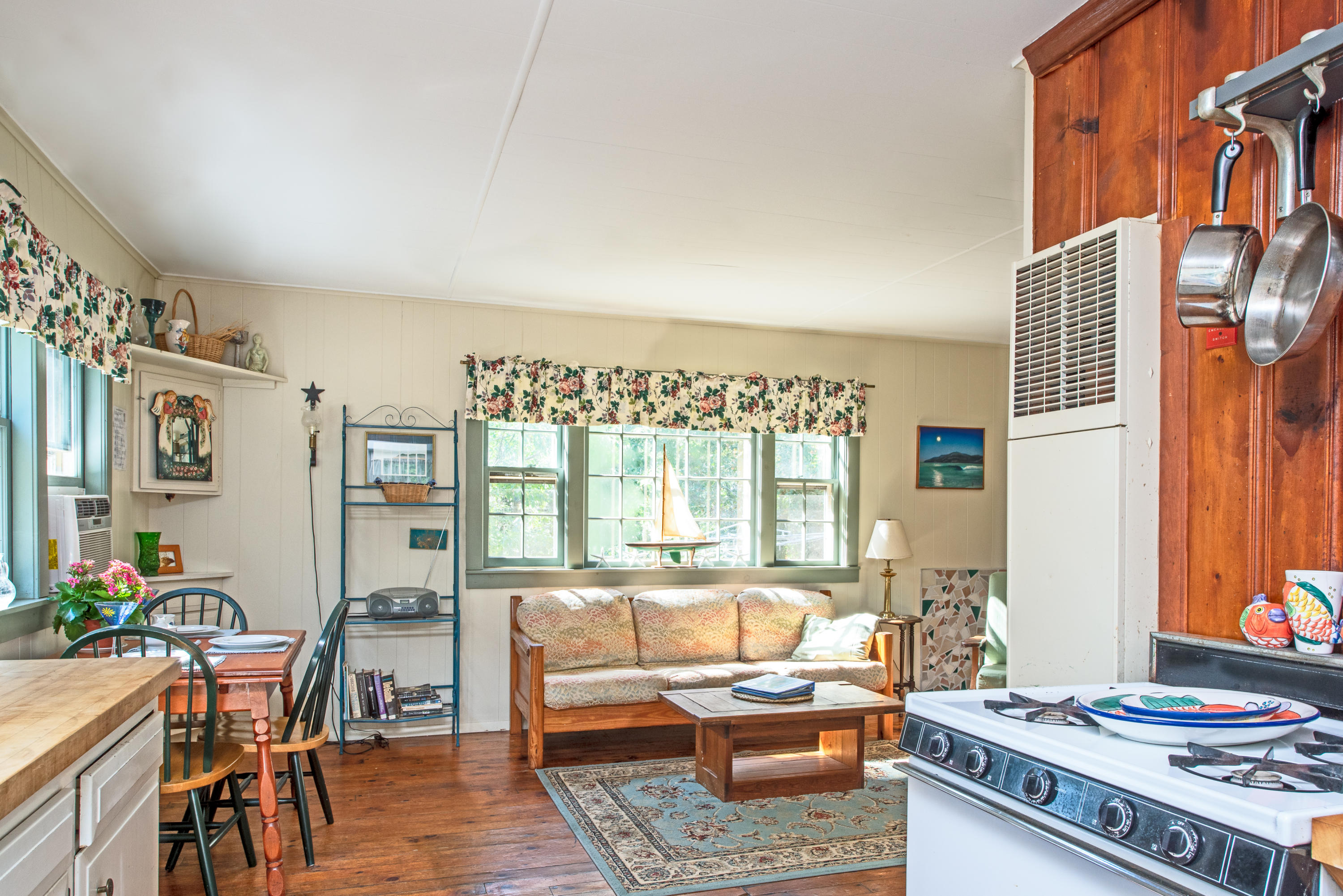 20 Baker Road, Unit B Wellfleet, MA 02667 - Photo 4 of 16 a living room with furniture and a large window
