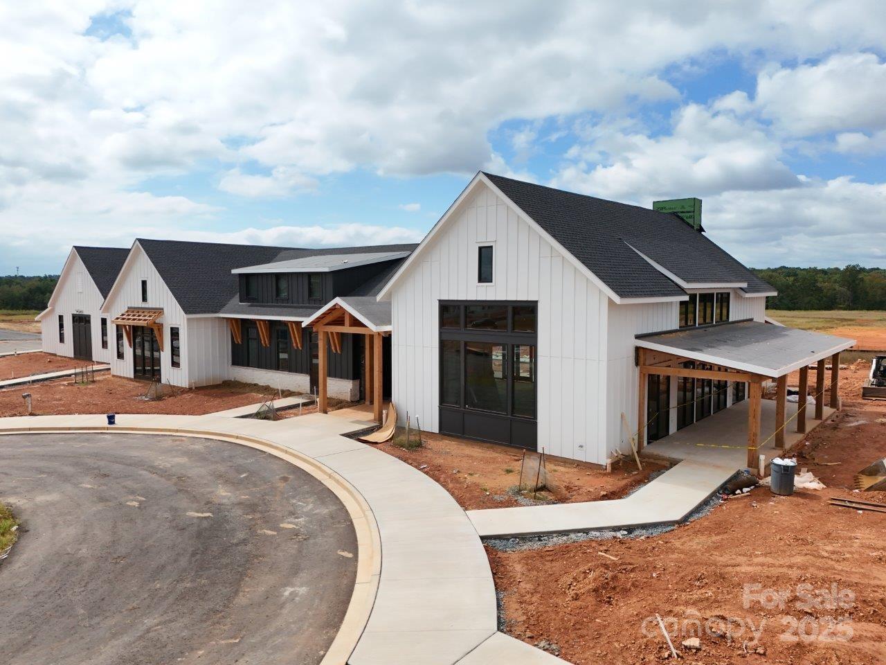 3679 Blue Pne Drive, Unit 179 Indian Land, SC 29707 - Photo 8 of 20 a front view of a house with a yard