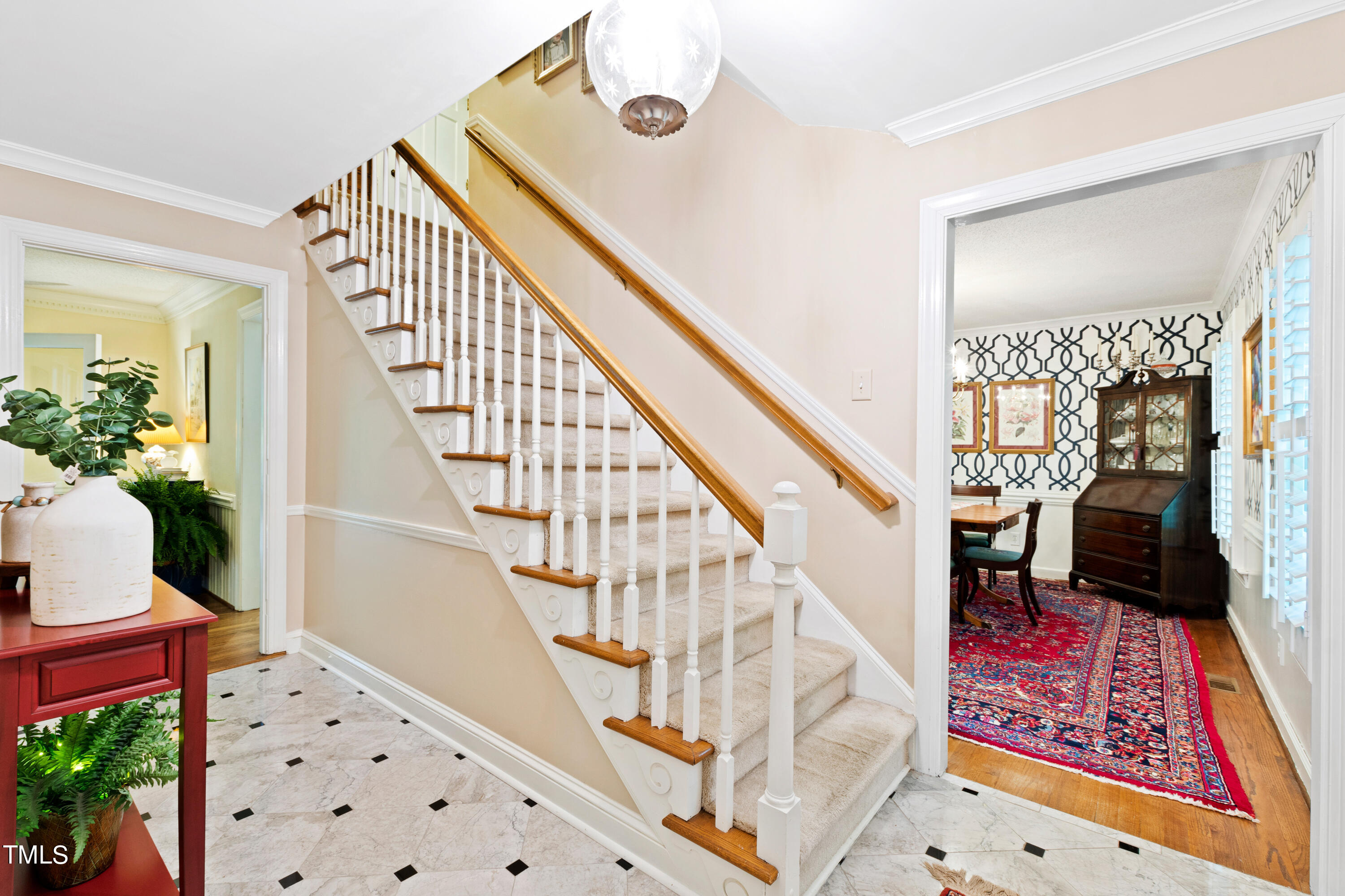 10212 Bushveld Lane Raleigh, NC 27613 - Photo 11 of 51 a view of entryway with wooden floor