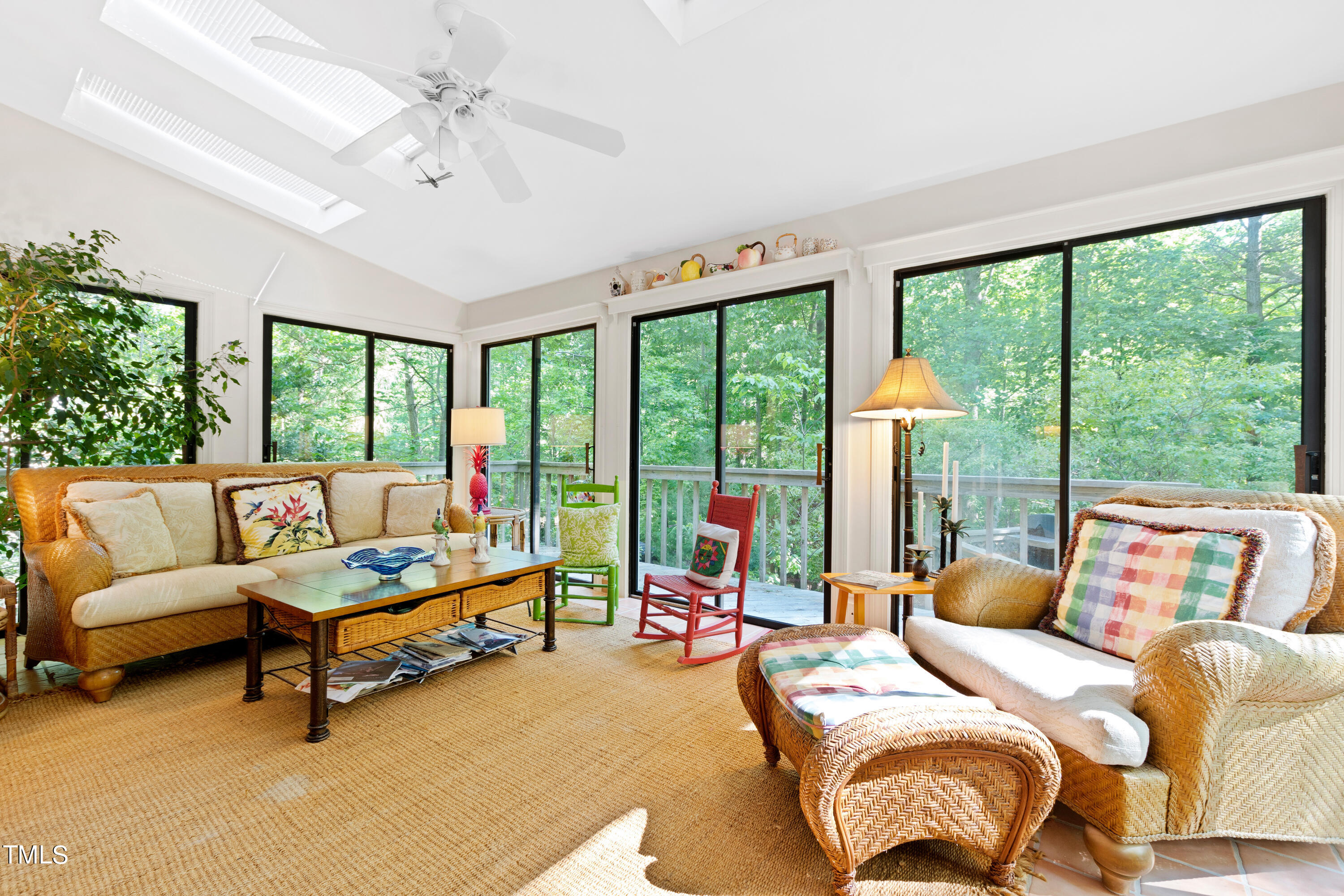 10212 Bushveld Lane Raleigh, NC 27613 - Photo 25 of 51 a bedroom with a bed and large window