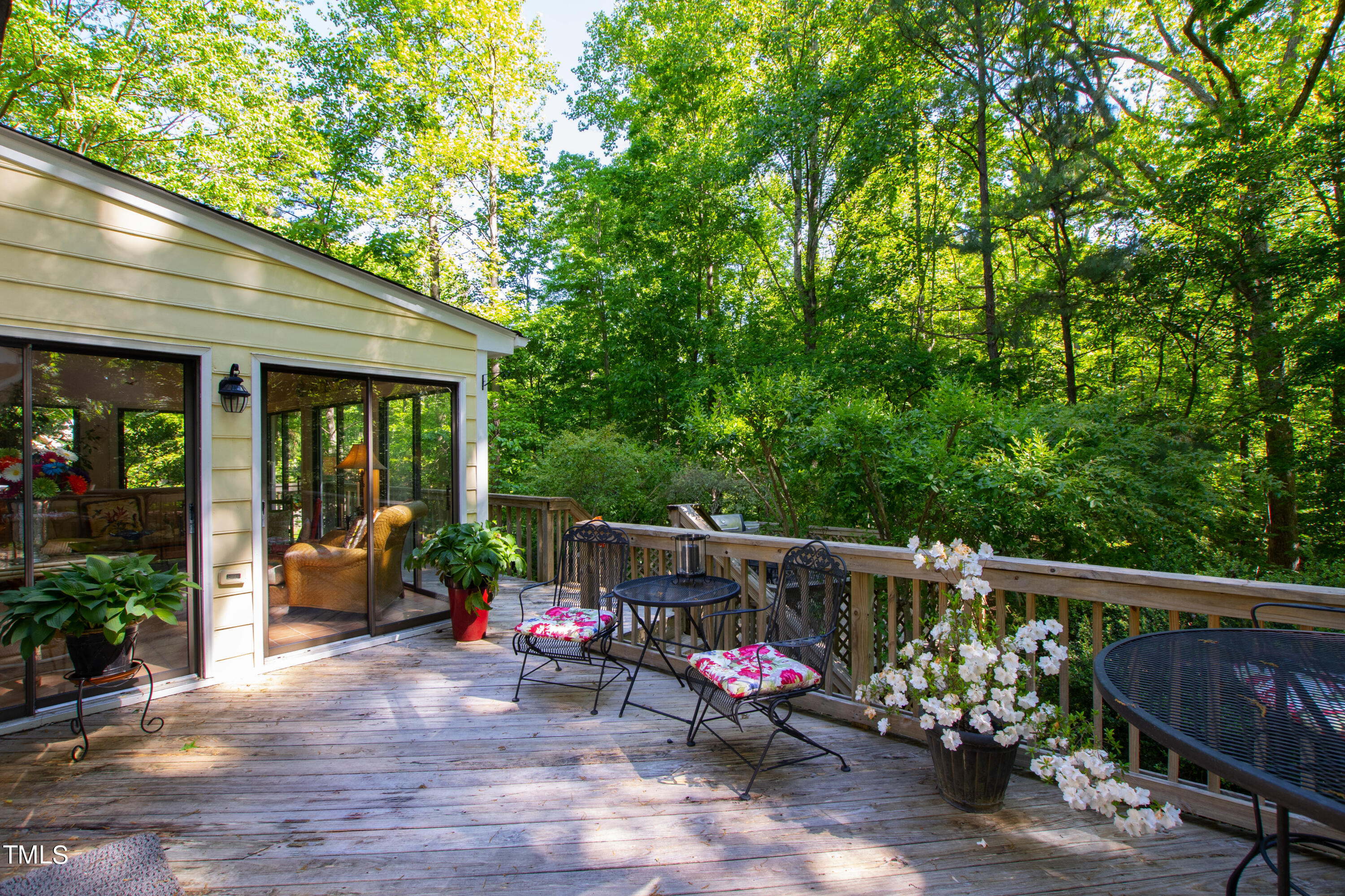 10212 Bushveld Lane Raleigh, NC 27613 - Photo 46 of 51 a view of a patio with furniture and garden