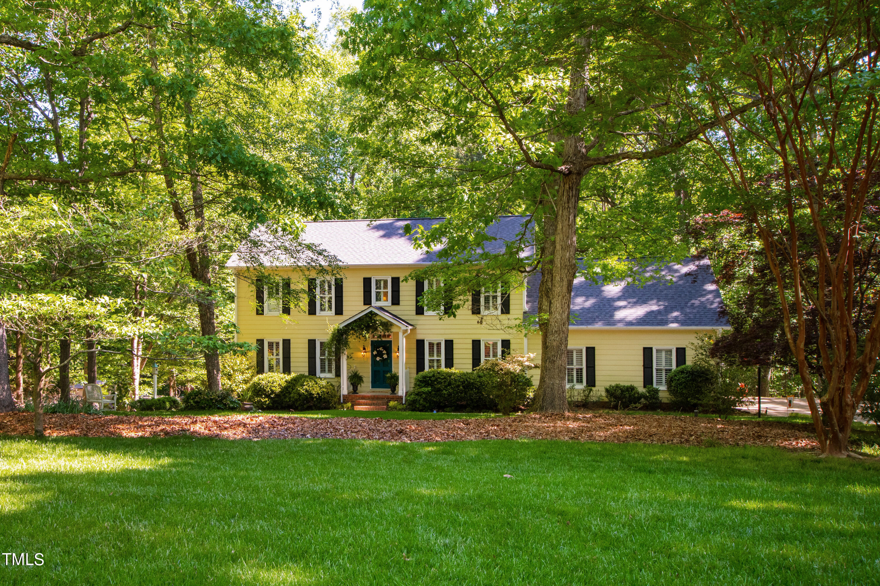 10212 Bushveld Lane Raleigh, NC 27613 - Photo 6 of 51 a view of a house with a yard