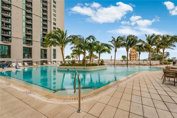 a view of swimming pool and lake