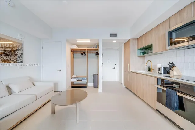 a view of a balcony with furniture