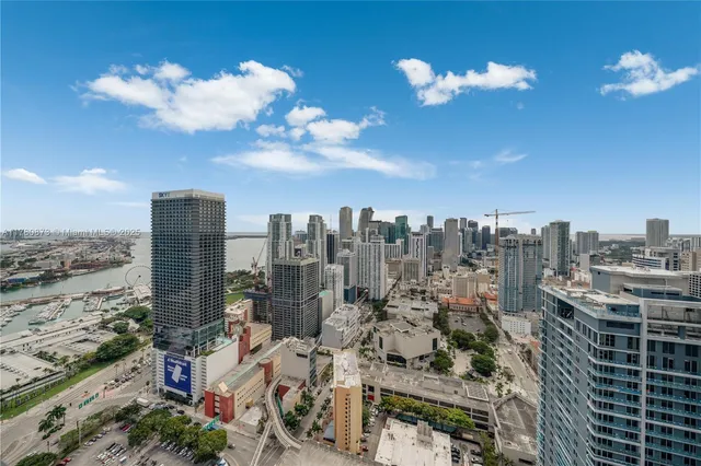 a view of a city with tall buildings