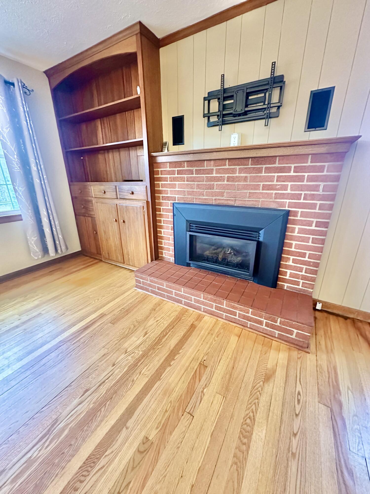 2714 Jackson River Road Covington, VA 24426 - Photo 23 of 54 a view of a kitchen with cabinets and wooden floor