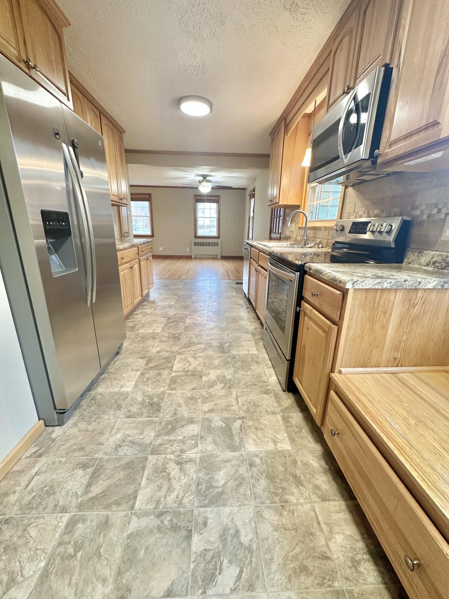 2714 Jackson River Road Covington, VA 24426 - Photo 28 of 54 a view of a kitchen with a sink and dishwasher