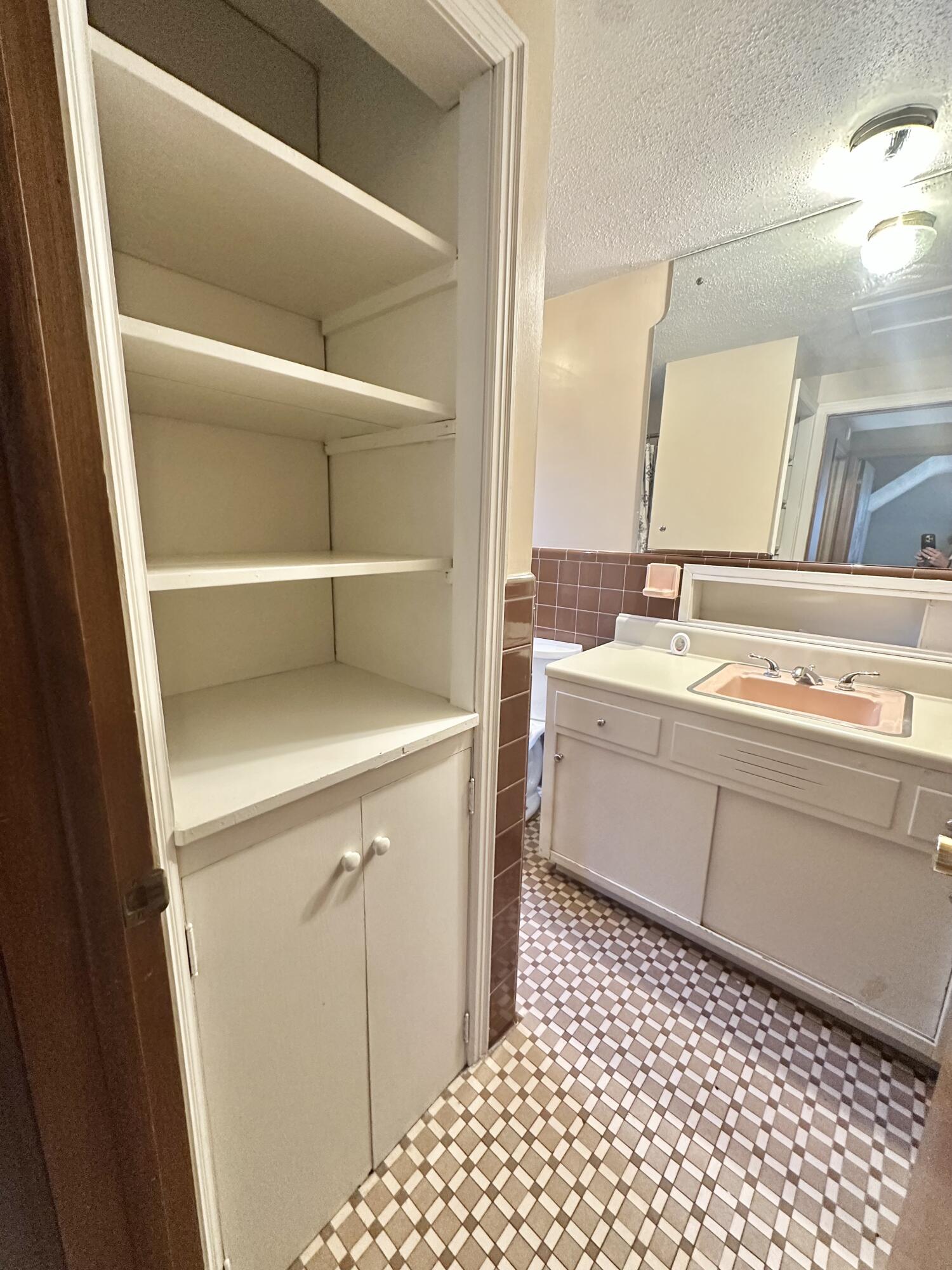 2714 Jackson River Road Covington, VA 24426 - Photo 47 of 54 a bathroom with a sink a toilet and a mirror