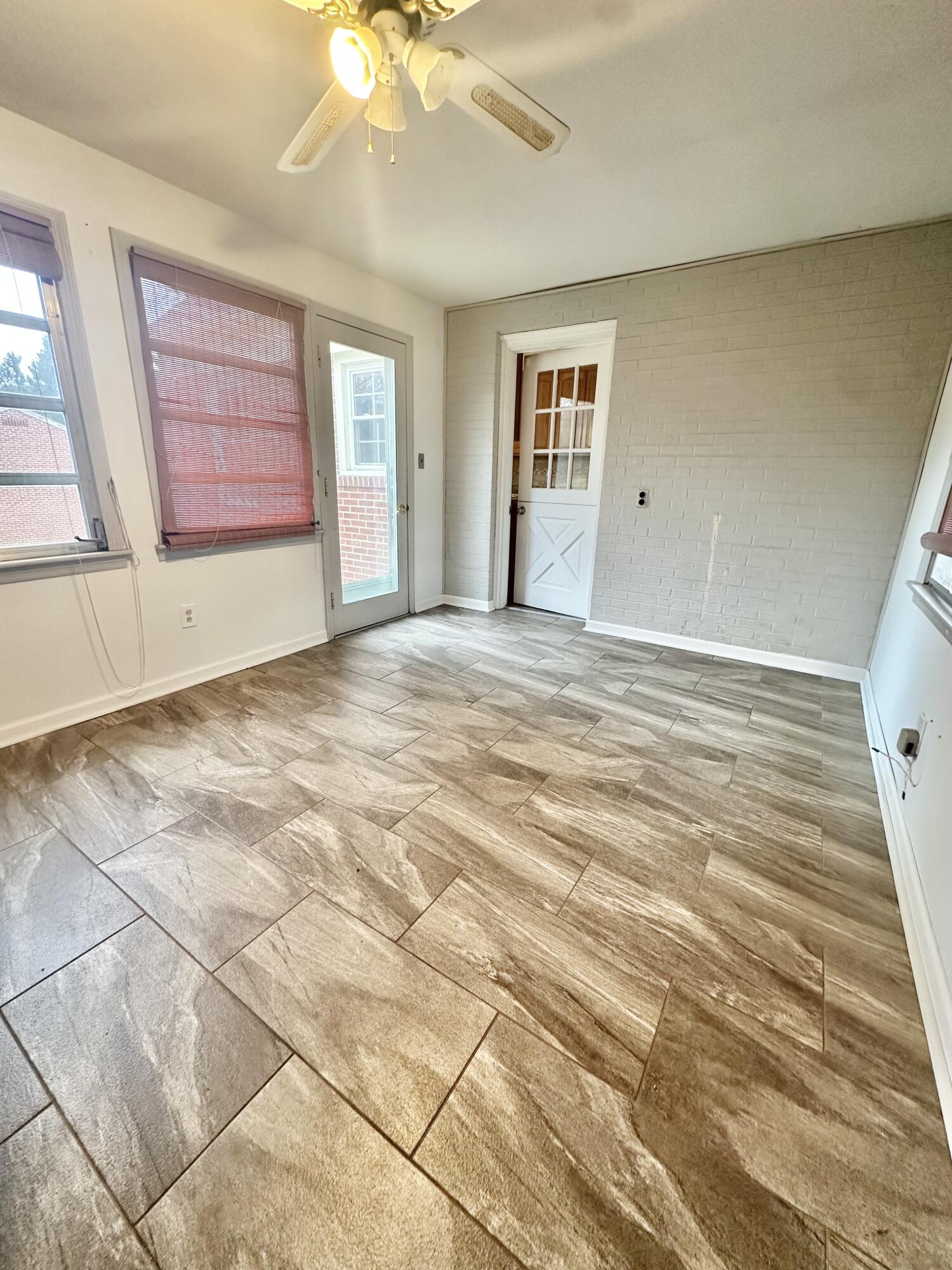 2714 Jackson River Road Covington, VA 24426 - Photo 51 of 54 a view of an empty room with window and cabinet