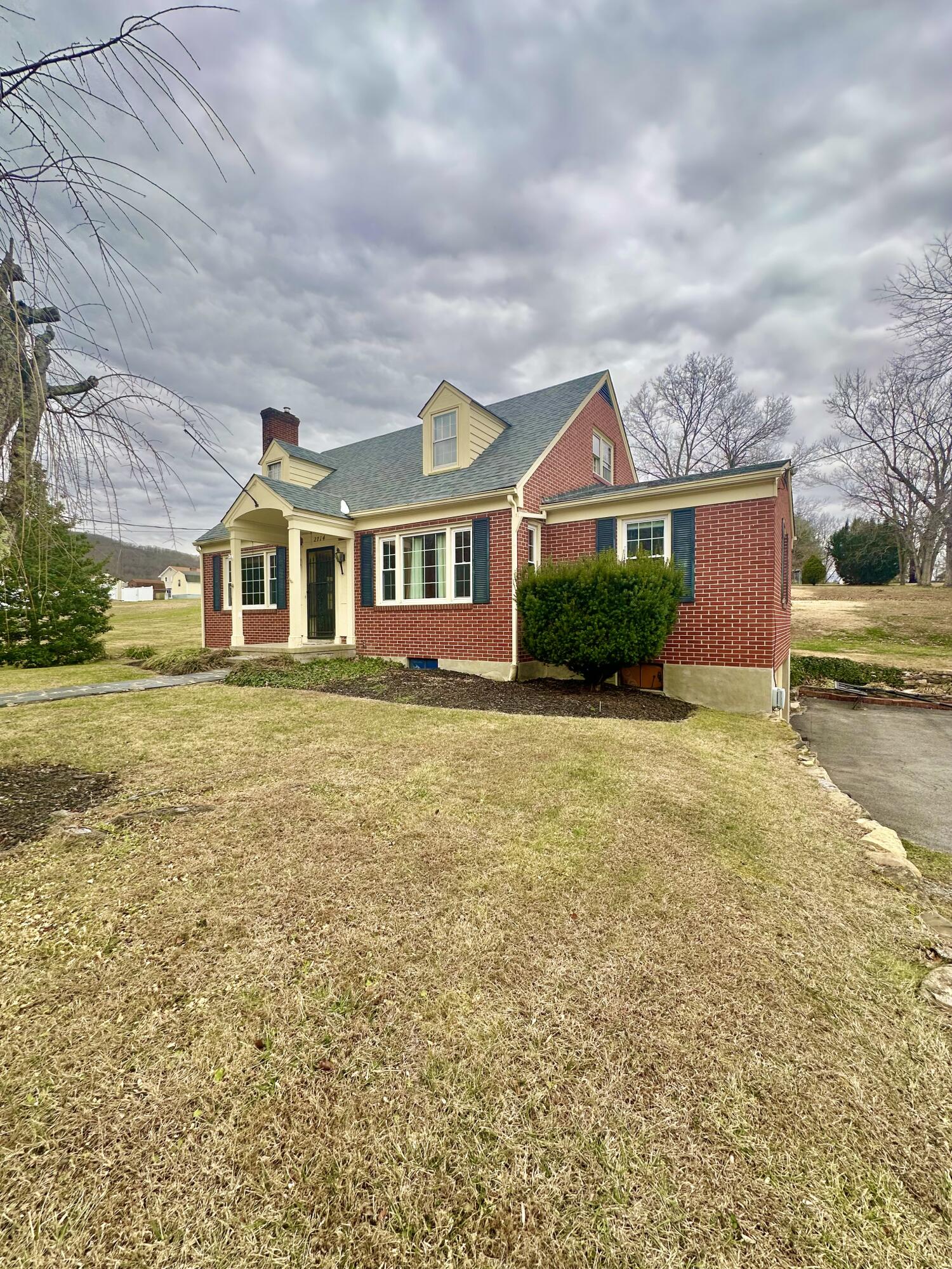 2714 Jackson River Road Covington, VA 24426 - Photo 6 of 54 a front view of house with yard and green space