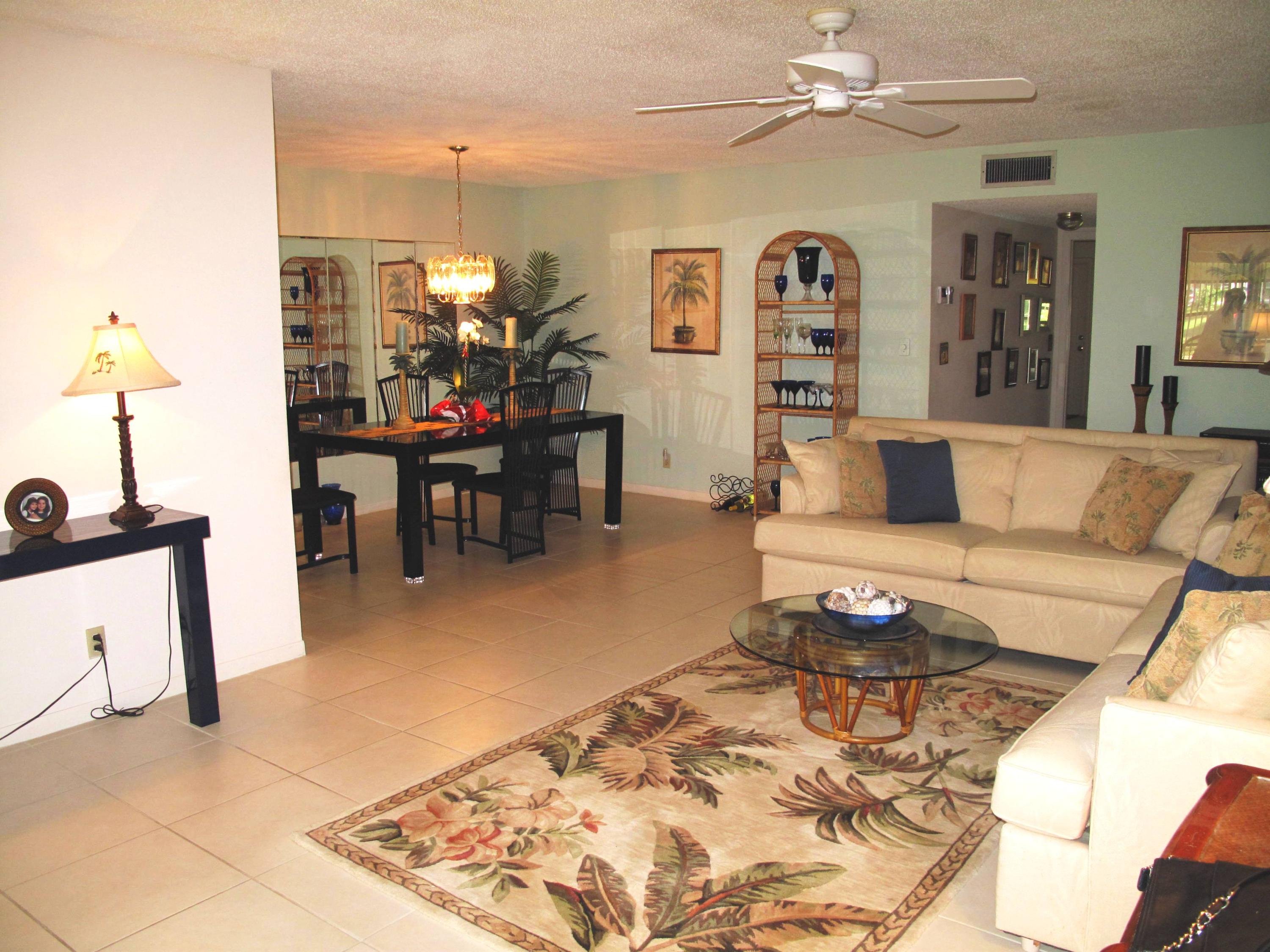 1317 High Point Way Southeast, Unit C Delray Beach, FL 33445 - Photo 1 of 40 Living and dining area