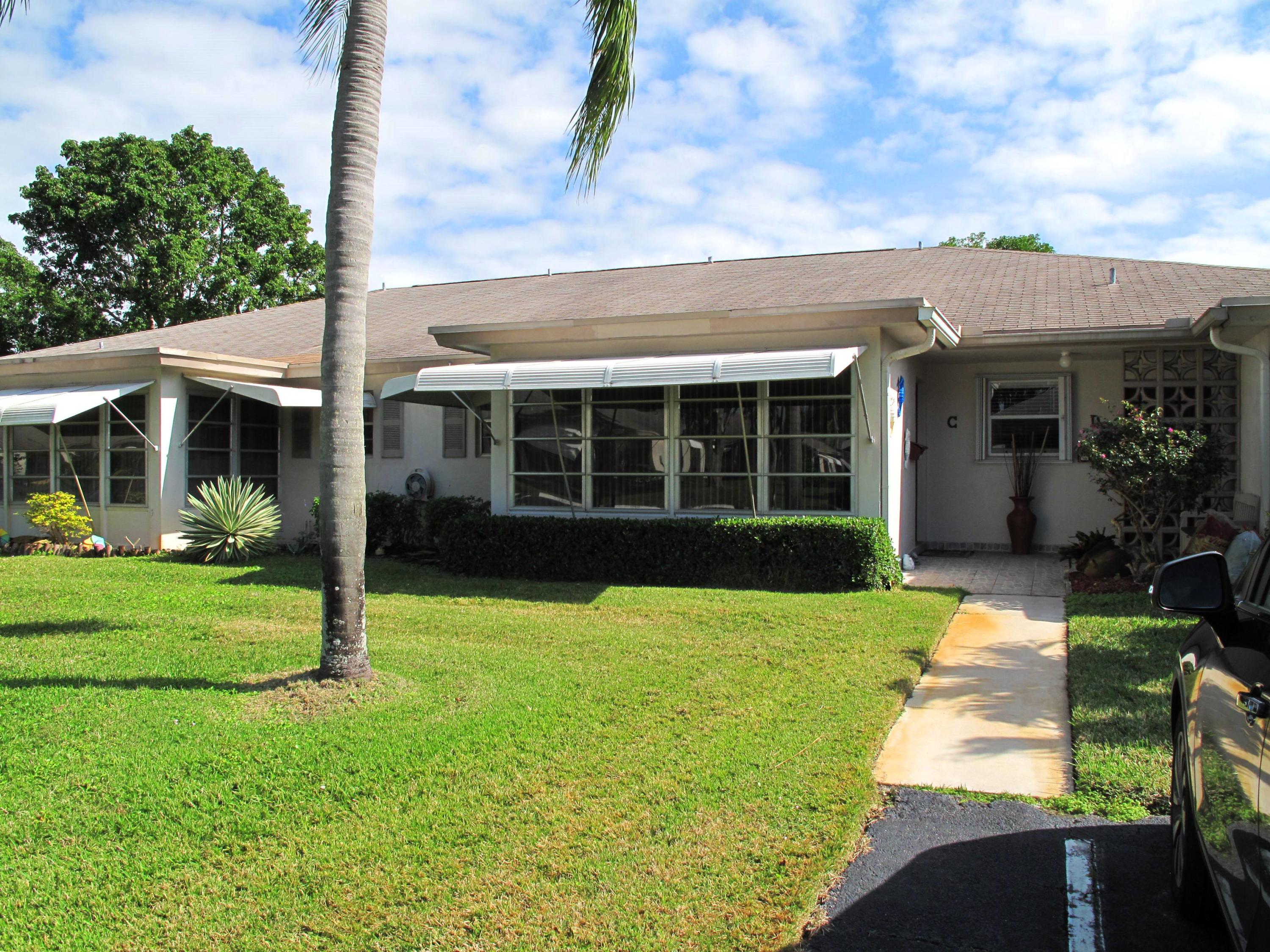 1317 High Point Way Southeast, Unit C Delray Beach, FL 33445 - Photo 2 of 40 Front view of villa