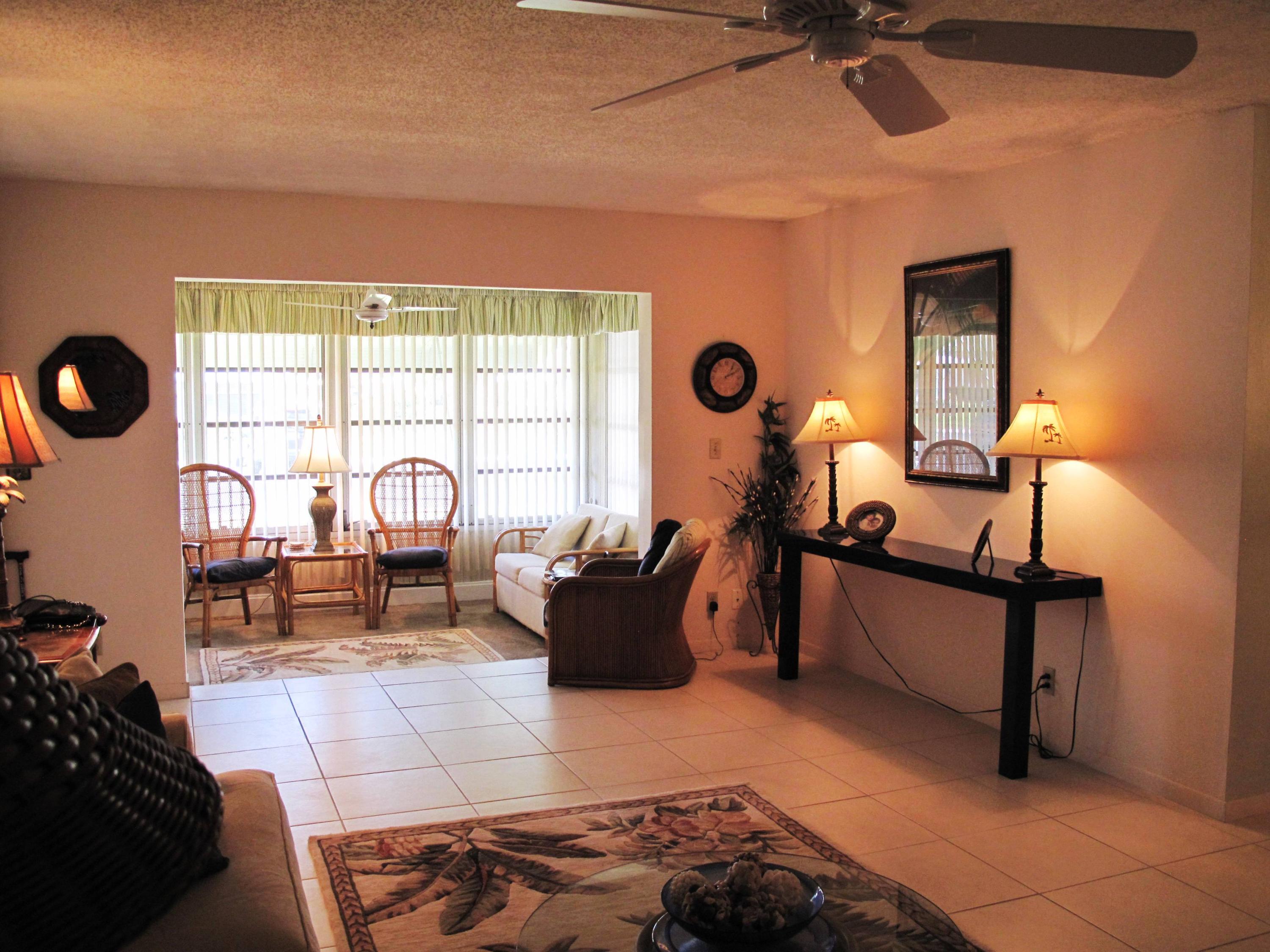 1317 High Point Way Southeast, Unit C Delray Beach, FL 33445 - Photo 7 of 40 Living room and Florida room view