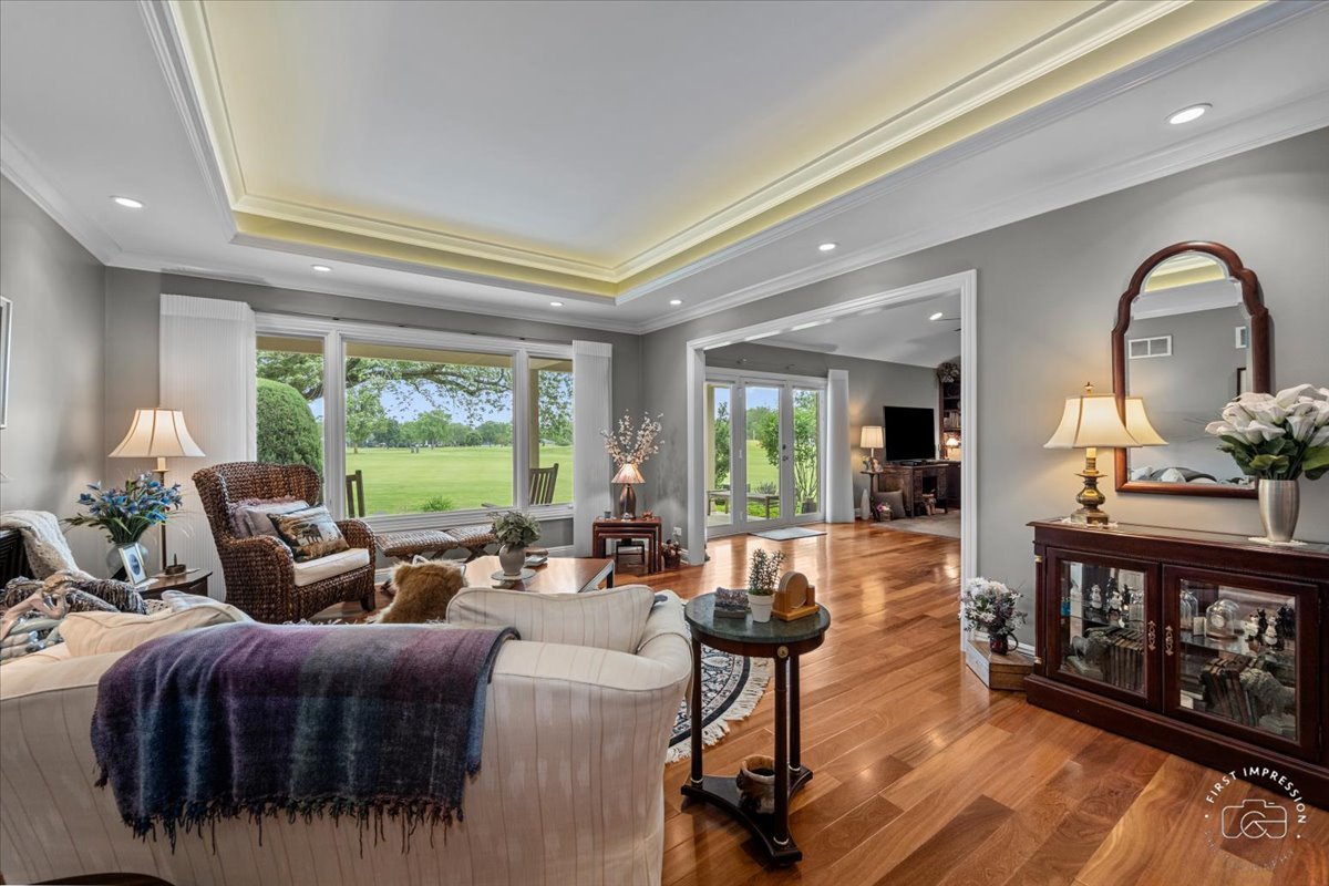 840 West Bauer Road Naperville, IL 60563 - Photo 15 of 37 a living room with furniture large window and wooden floor