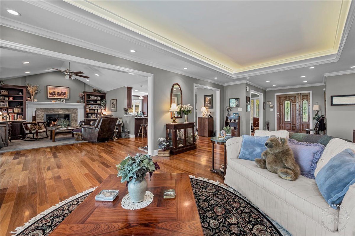 840 West Bauer Road Naperville, IL 60563 - Photo 17 of 37 a living room with furniture and wooden floor