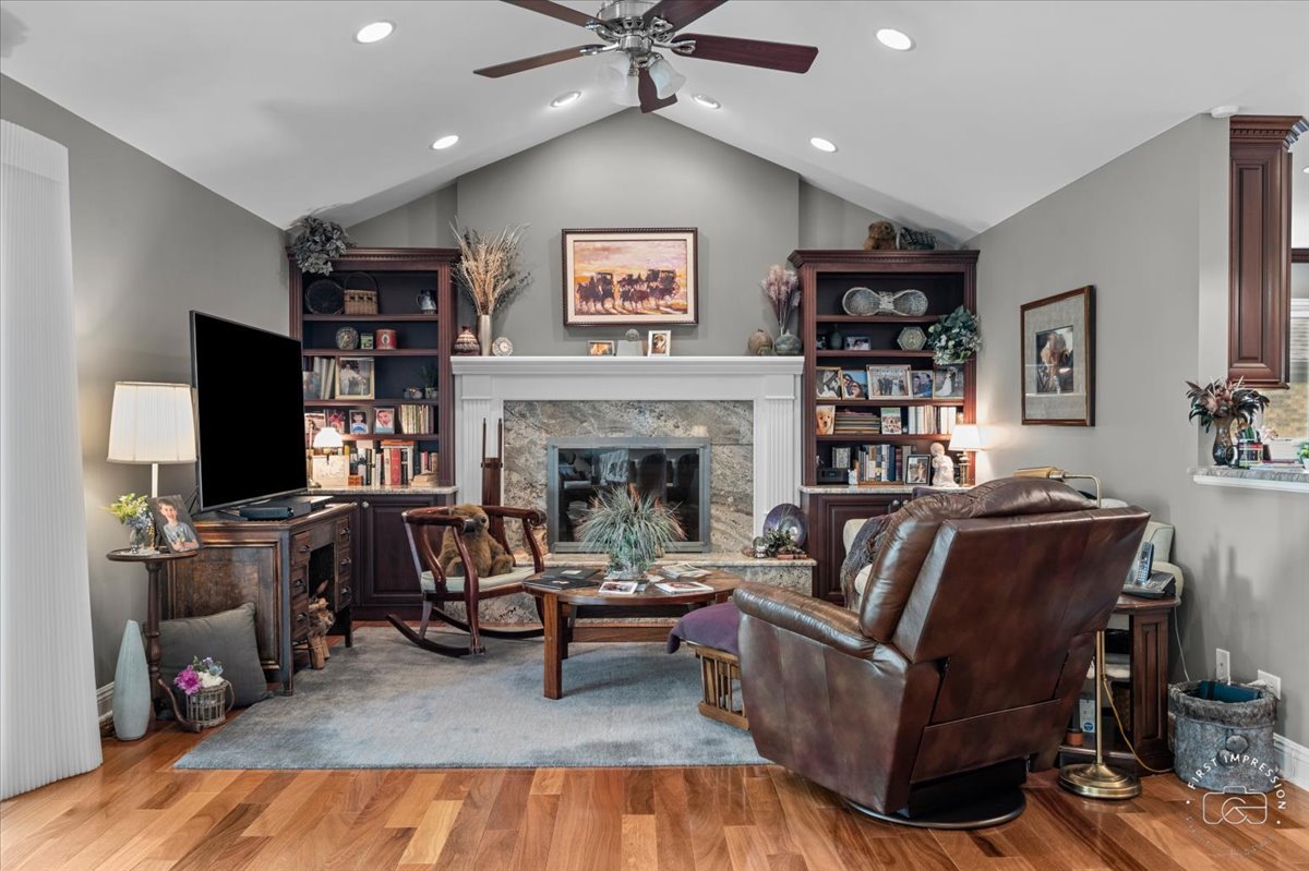 840 West Bauer Road Naperville, IL 60563 - Photo 19 of 37 a living room with furniture and a flat screen tv