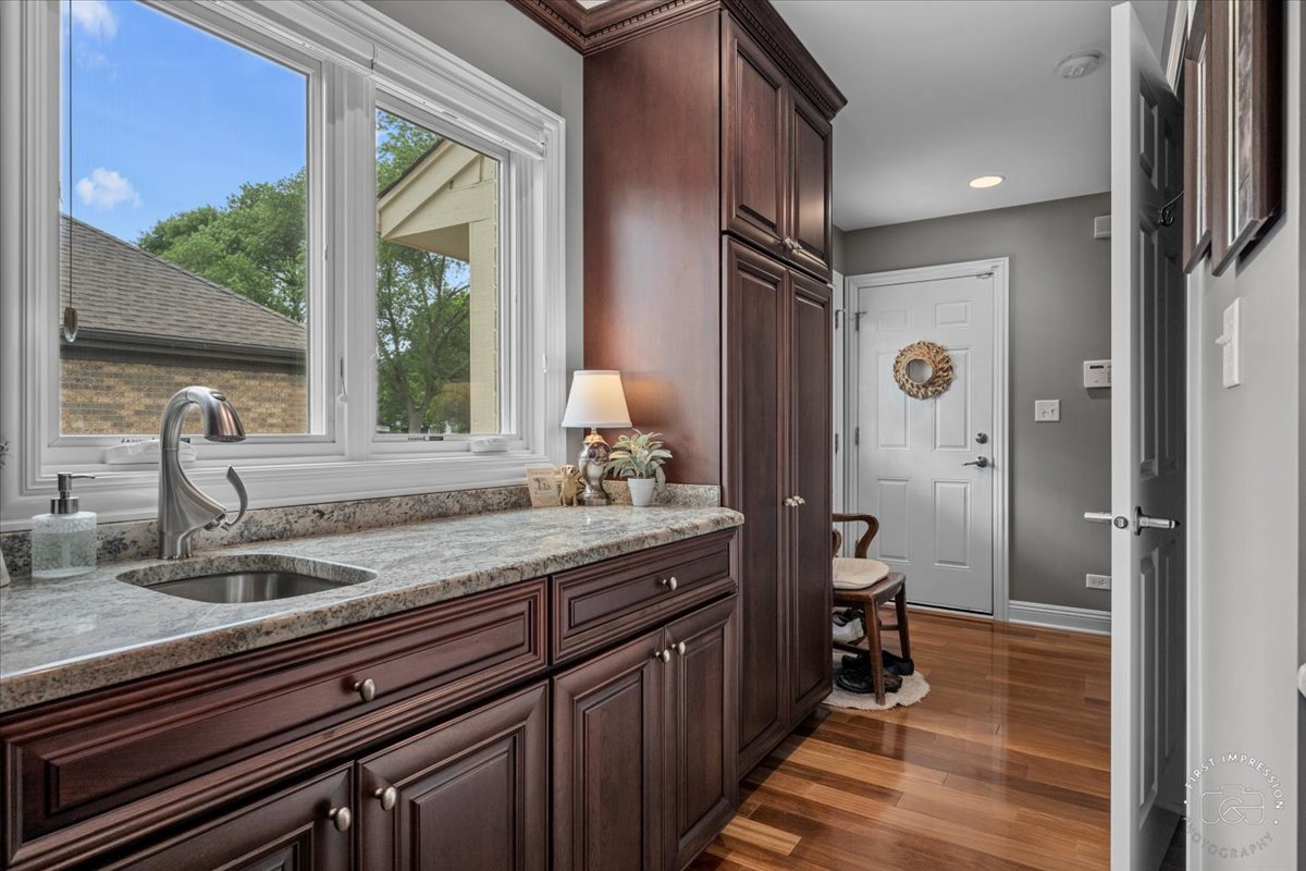 840 West Bauer Road Naperville, IL 60563 - Photo 22 of 37 a bathroom with a granite countertop sink toilet and shower