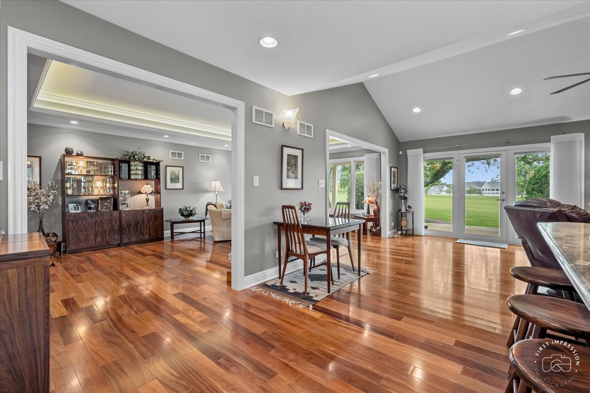 840 West Bauer Road Naperville, IL 60563 - Photo 25 of 37 a view of a dining room with furniture and wooden floor