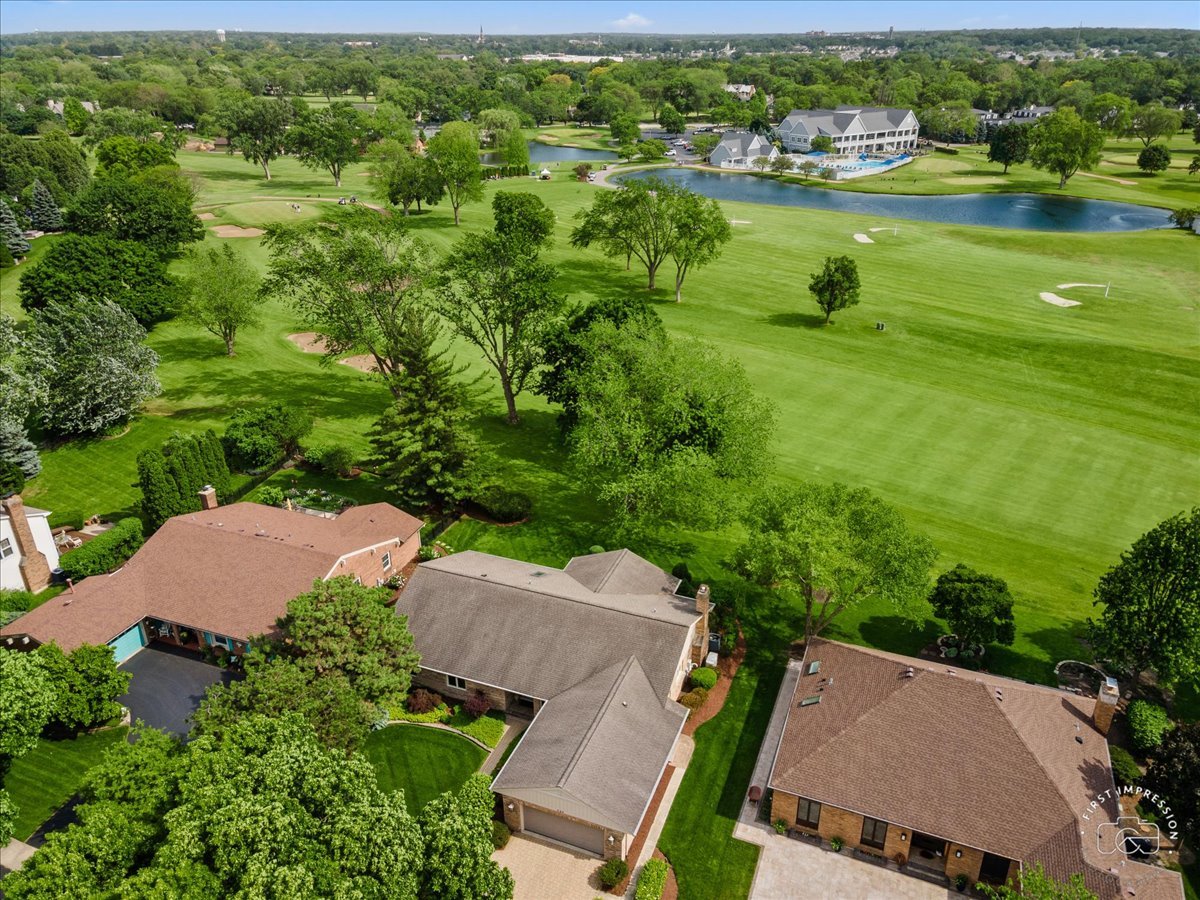 840 West Bauer Road Naperville, IL 60563 - Photo 3 of 37 an aerial view of a houses with outdoor space and lake view