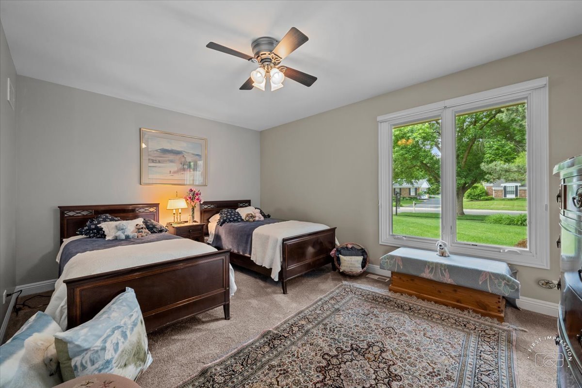 840 West Bauer Road Naperville, IL 60563 - Photo 32 of 37 a bedroom with furniture and a large window