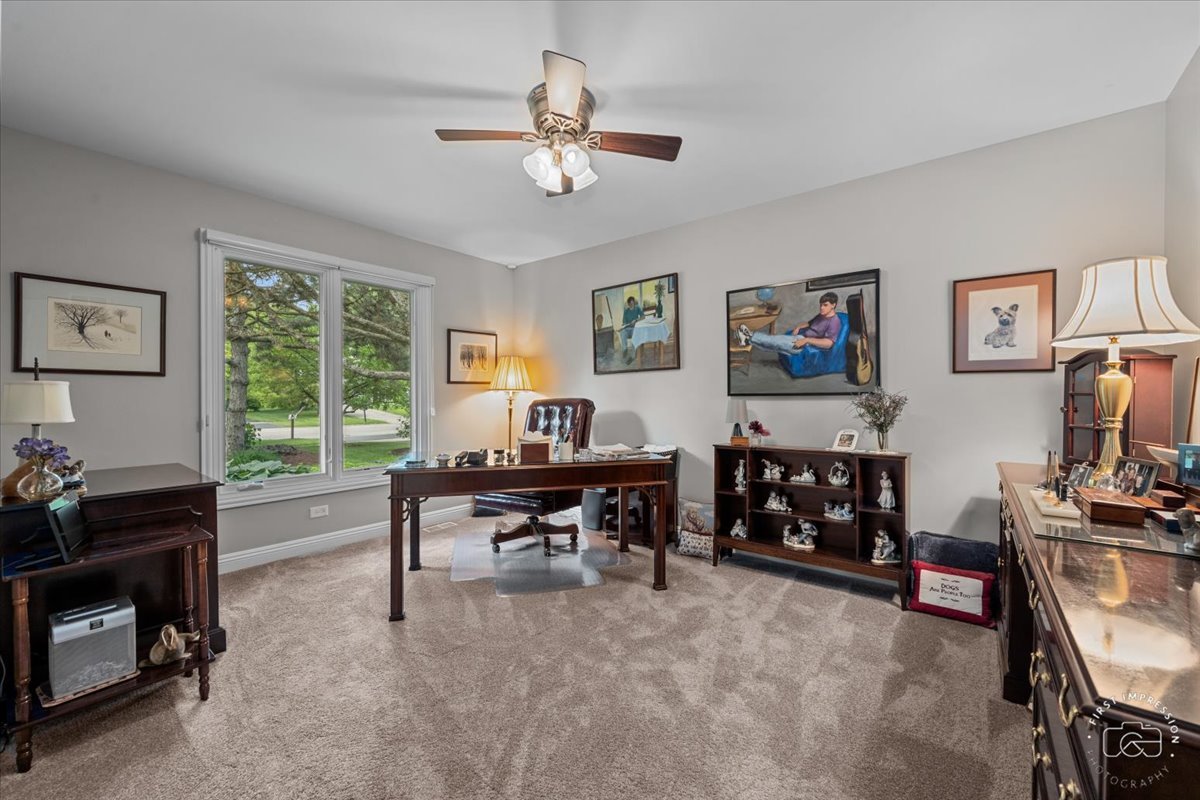840 West Bauer Road Naperville, IL 60563 - Photo 34 of 37 a view of a workspace with a window and lounge chair