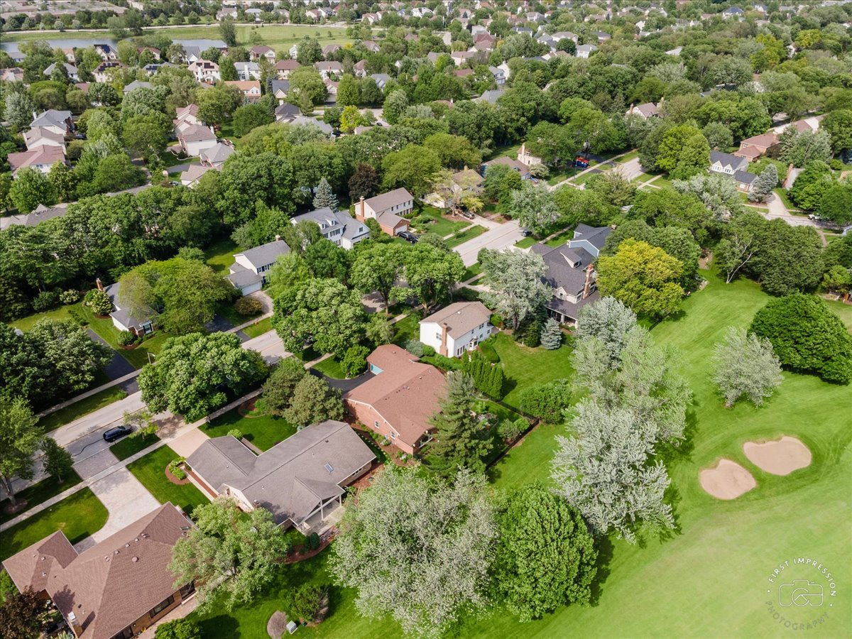 840 West Bauer Road Naperville, IL 60563 - Photo 6 of 37 an aerial view of residential house with outdoor space and trees all around