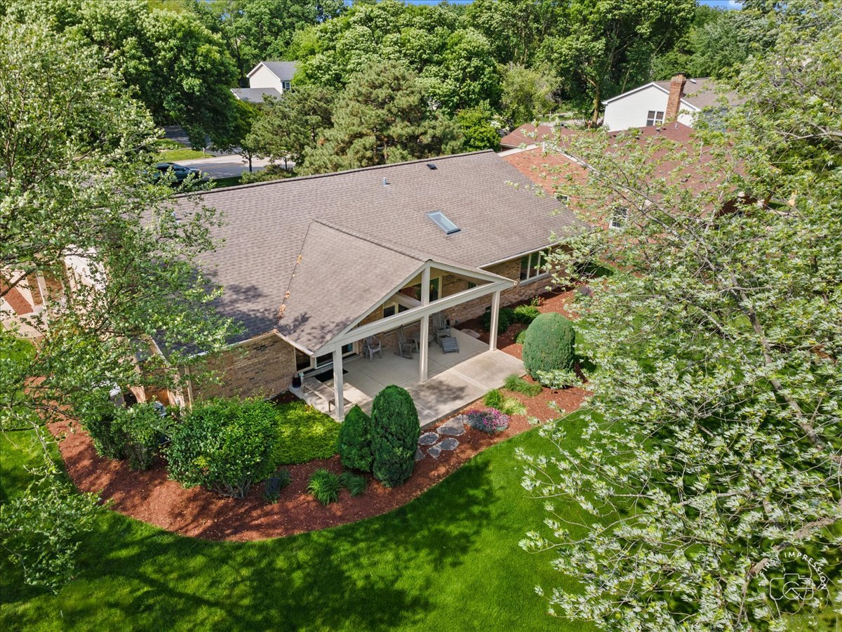 840 West Bauer Road Naperville, IL 60563 - Photo 9 of 37 an aerial view of a house with swimming pool and garden