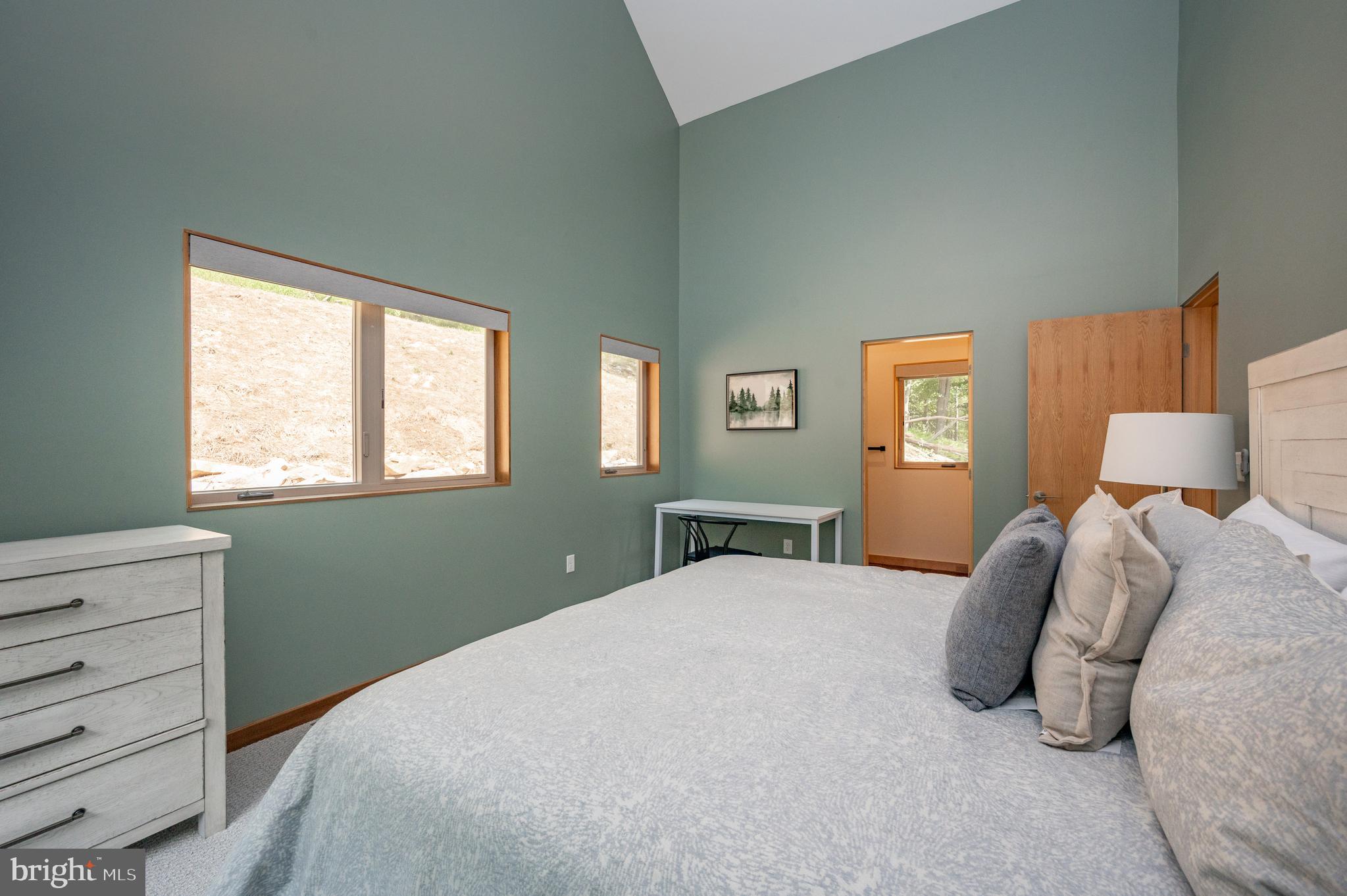 2614 Marsh Hill Road McHenry, MD 21541 - Photo 41 of 76 a bedroom with a bed and a window