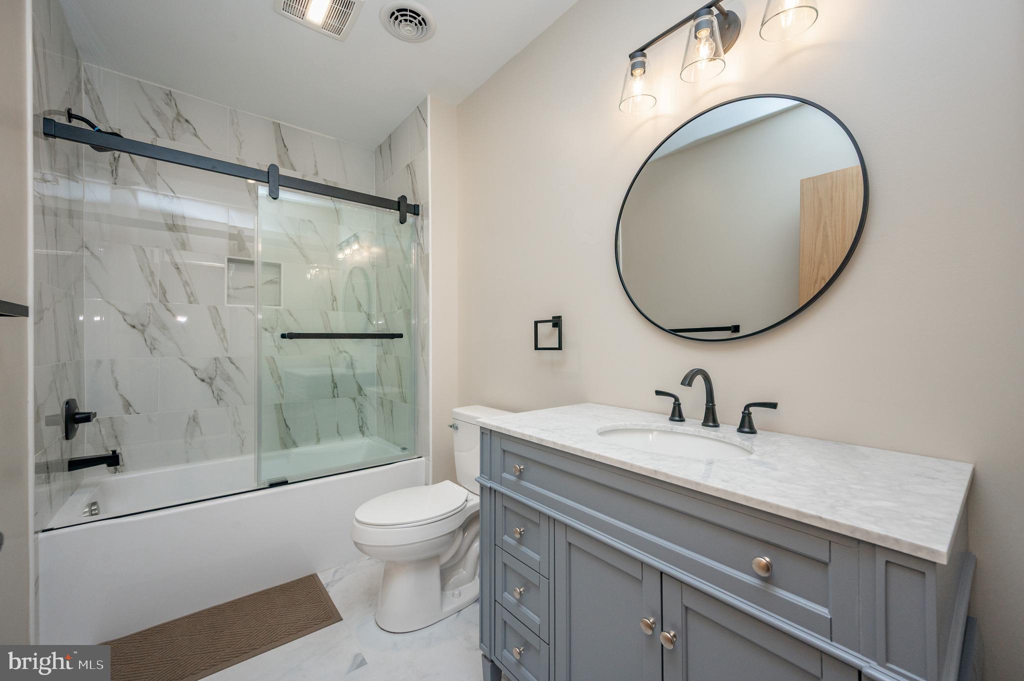 2614 Marsh Hill Road McHenry, MD 21541 - Photo 46 of 76 a bathroom with a sink a toilet and a mirror