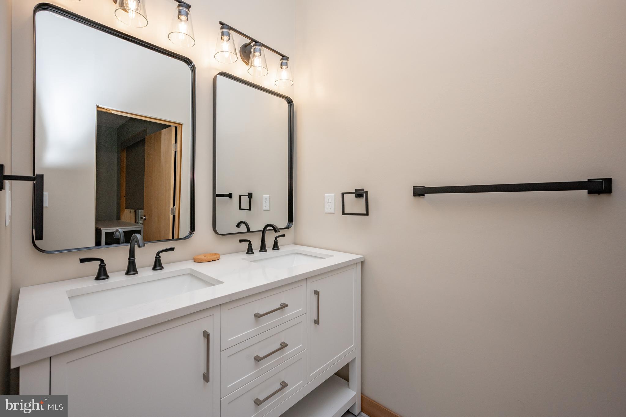 2614 Marsh Hill Road McHenry, MD 21541 - Photo 50 of 76 a bathroom with a sink and a mirror