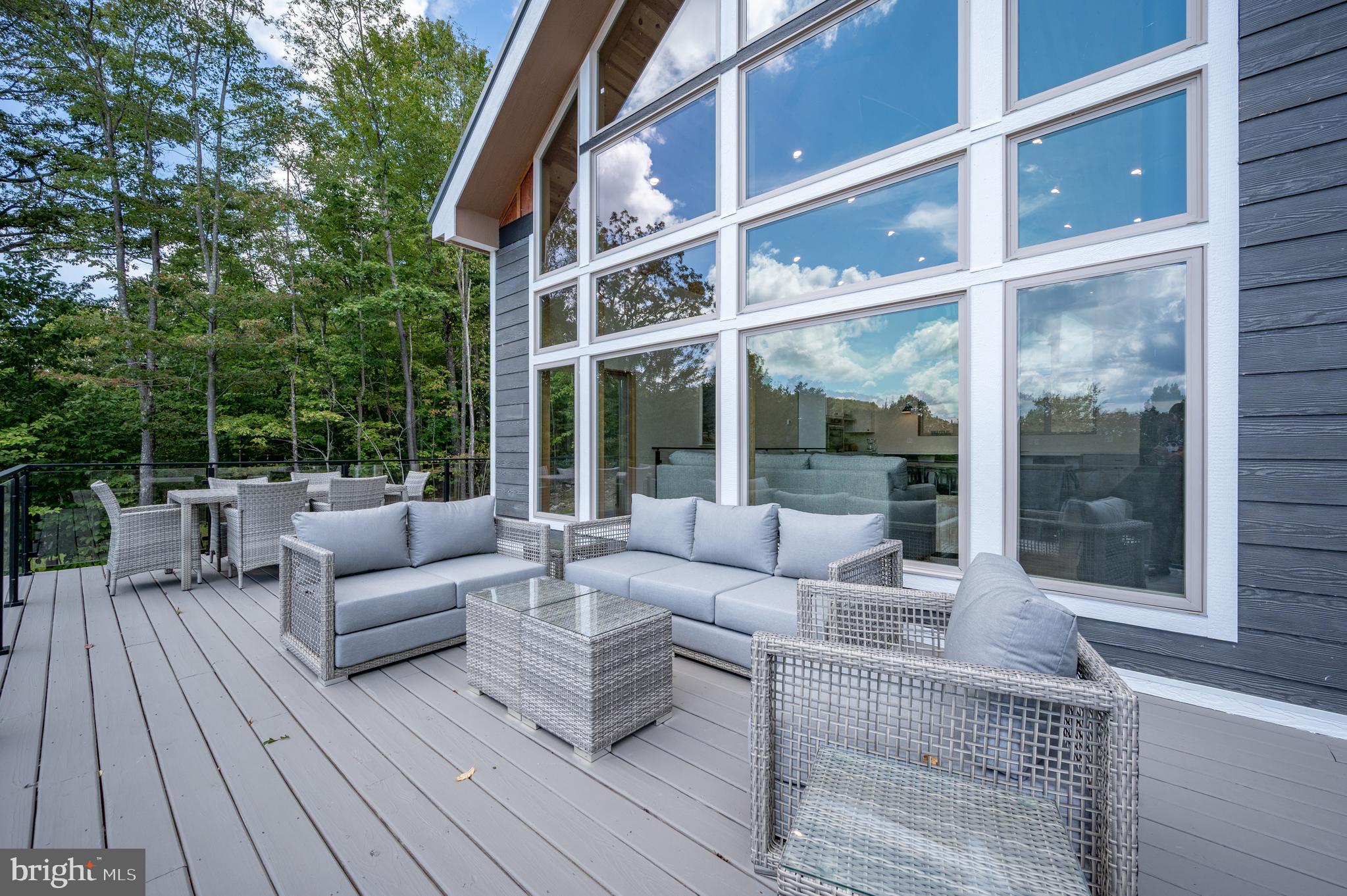 2614 Marsh Hill Road McHenry, MD 21541 - Photo 69 of 76 a balcony with furniture and wooden floor
