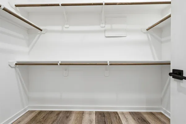 a bathroom with a shower and a sink