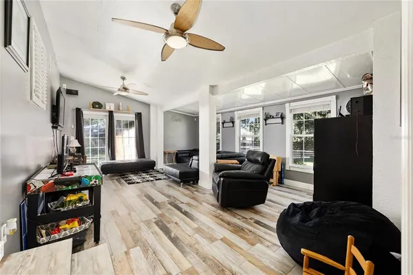 a living room with furniture and a window