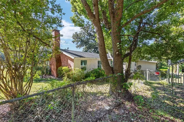 a view of a house with swimming pool