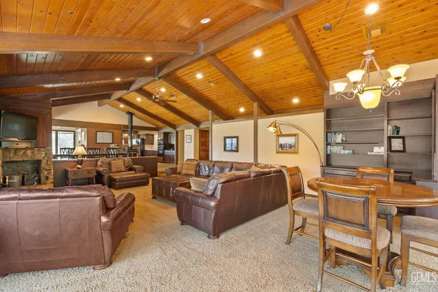 a bedroom with a bed and a ceiling fan