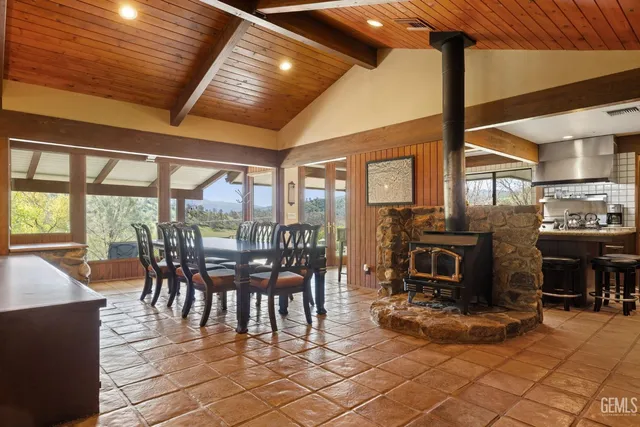 a bedroom with a bed and a ceiling fan