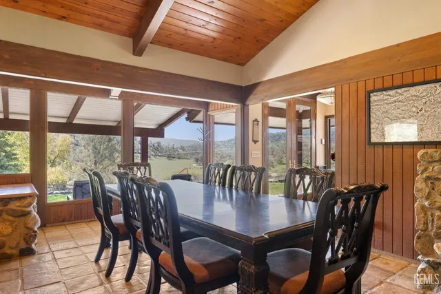 a bathroom with a granite countertop sink mirror and