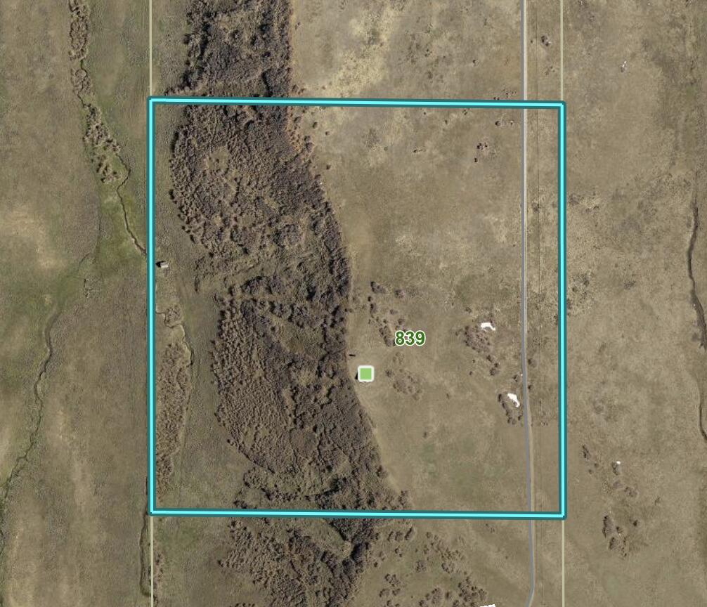 view of a bathroom with a shower and a sink