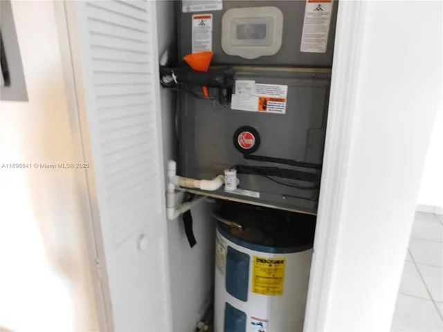a kitchen with stainless steel appliances a sink stove and cabinets