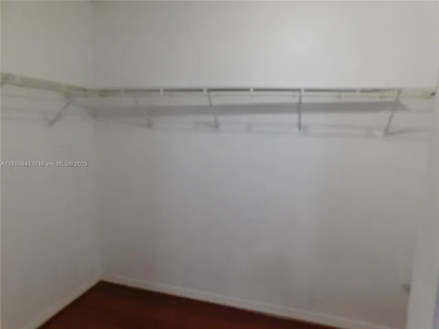 a bathroom with a sink a toilet and bathtub