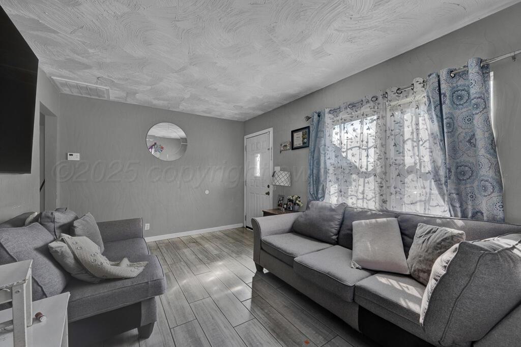 1204 North Arapahoe Street Amarillo, TX 79107 - Photo 3 of 8 living room 2