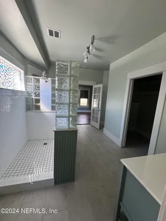 a view of kitchen and windows