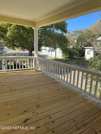 a view of a balcony with lake view